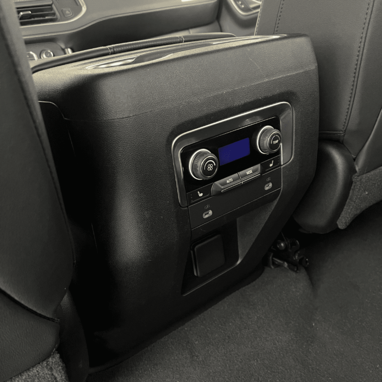 Clean center console after a Cleaner Bros detail
