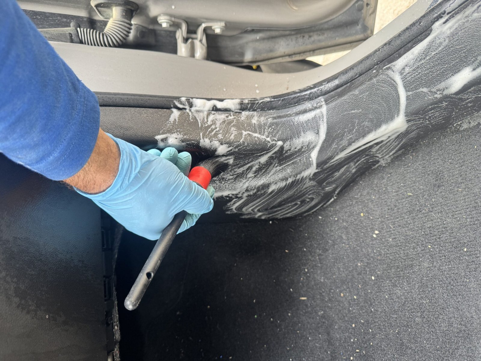 Detail brush cleaning car interior