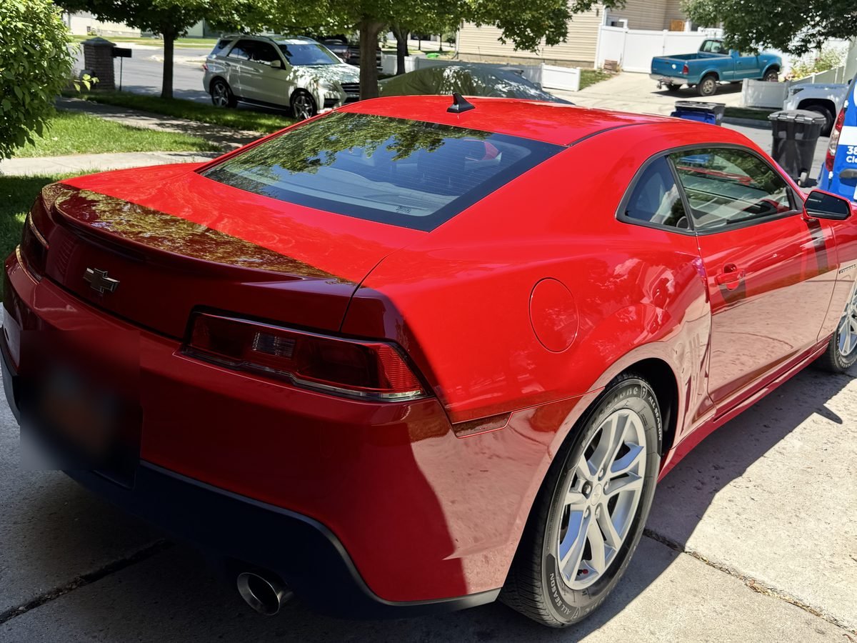Red Camaro after an exterior detail in Elk Ridge