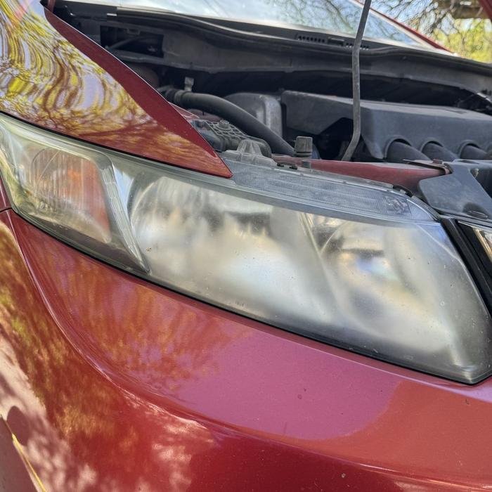 Oxidized headlight before restoration