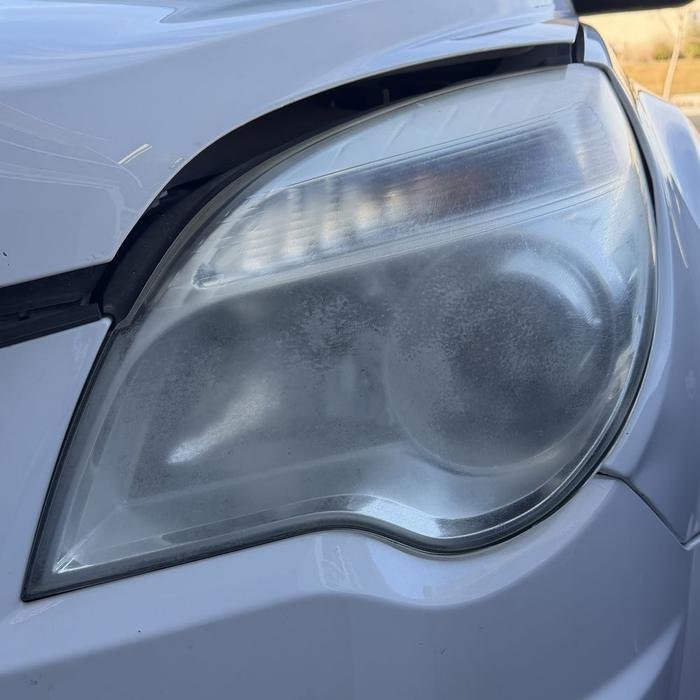 Chevy Equinox headlight cloudy before restoration