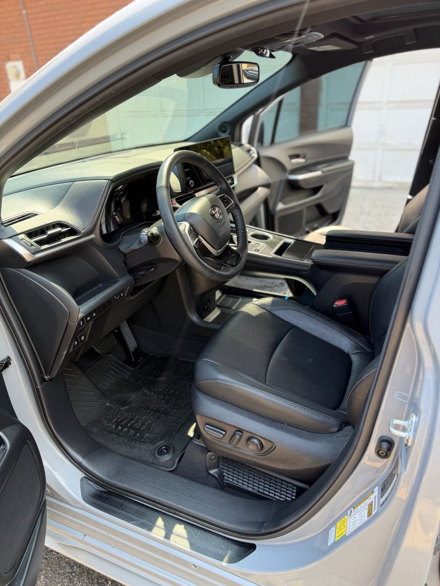 Minivan front seat after an interior detail in Salem