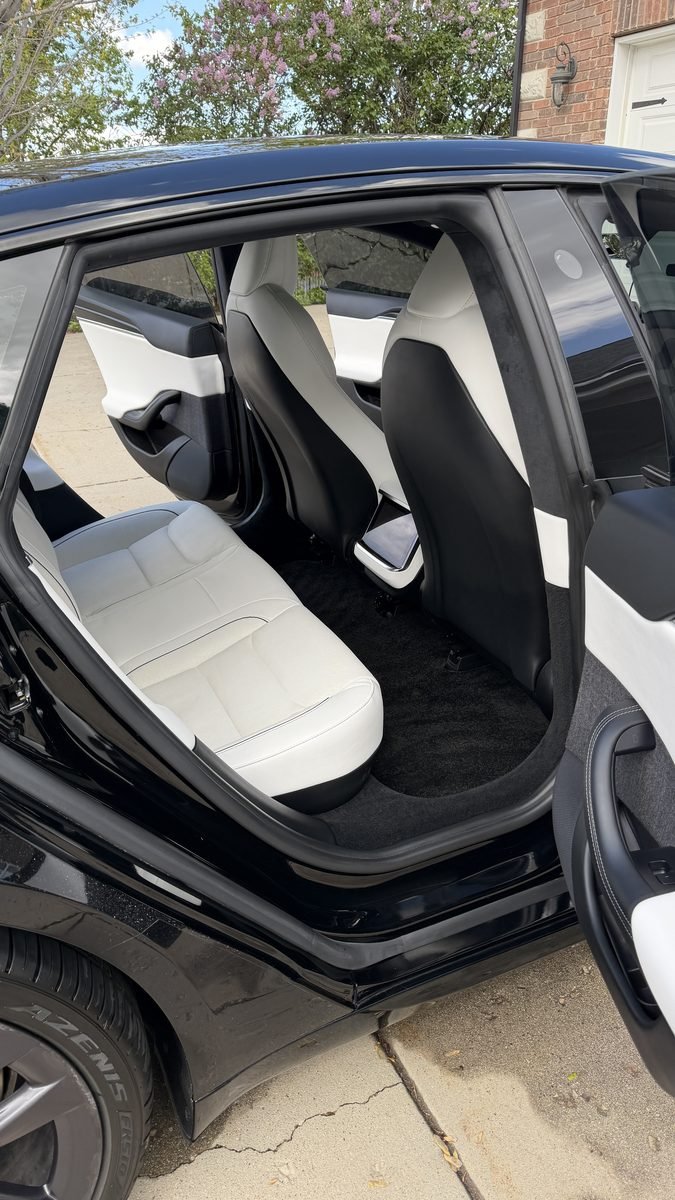 White Tesla back seat after an interior detail in Cedar Hills