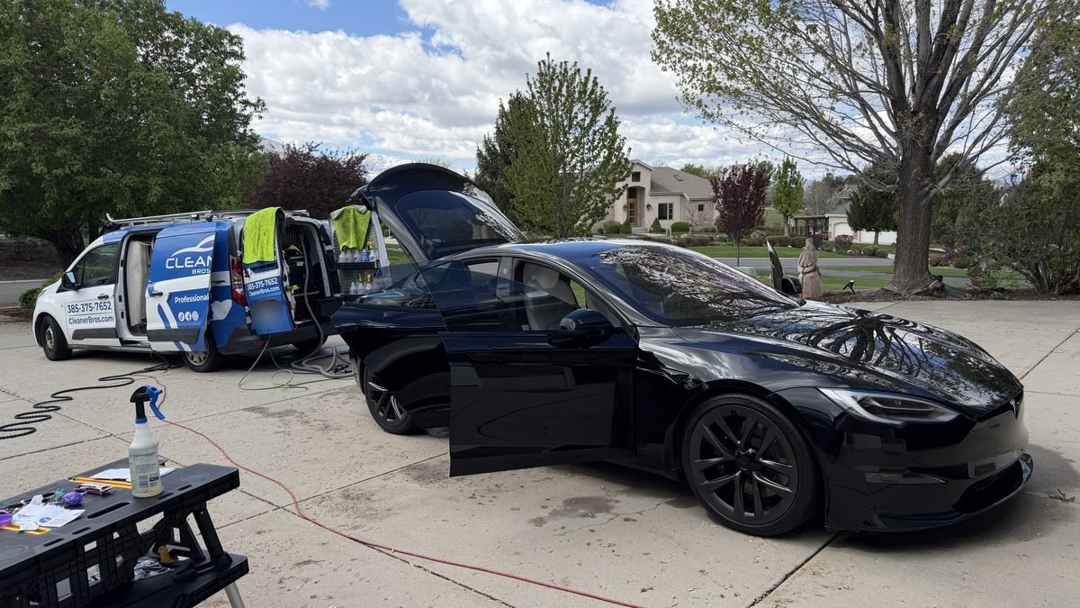 Cleaner Bros van and a Tesla Model S during a mobile detail in Salem, Utah