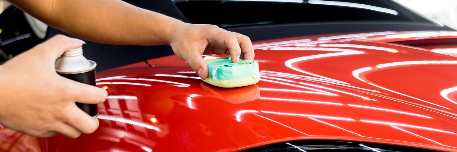 bigstock-Car-Service-Worker-Applying-Na-375974350